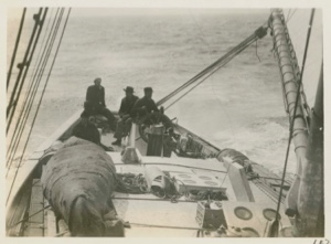 Image of Bowdoin at sea, left to right: Joe Field, Henry Warren, Ken Rawson, and Alfred 